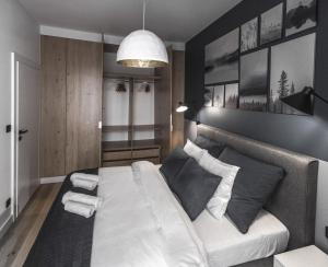 Posteľ alebo postele v izbe v ubytovaní MyCherry - Old Town Apartment - Księcia Witolda 11