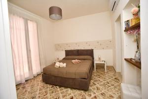 Postel nebo postele na pokoji v ubytování Casa Sarina