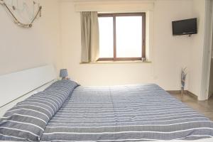 Postel nebo postele na pokoji v ubytování Casa Sarina