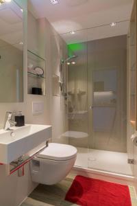 Bathroom sa neyland apartments Norderney