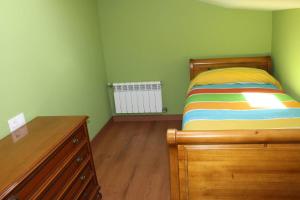 A bed or beds in a room at Casa Dana