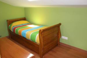 A bed or beds in a room at Casa Dana