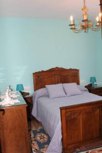 A bed or beds in a room at Casa Dana