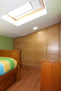 A bed or beds in a room at Casa Dana