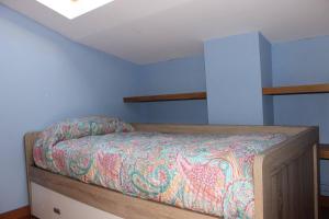A bed or beds in a room at Casa Dana