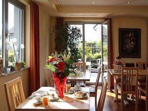 A restaurant or other place to eat at Das smarte Hotel garni