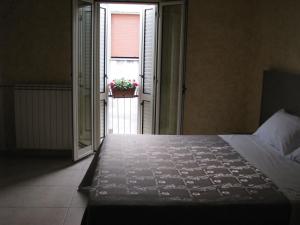 Postel nebo postele na pokoji v ubytování B&B Casa Venezia