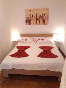 Postel nebo postele na pokoji v ubytování Apartment Porat