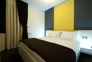 Cama o camas de una habitación en Hotel Soa