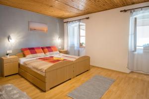 a bedroom with a bed in a room at Holiday Home Giovanni Vabriga with private Jacuzzi in Vabriga