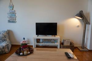 TV a/nebo společenská místnost v ubytování Seaview apartment