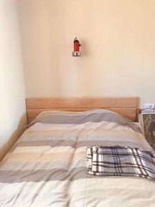 Postel nebo postele na pokoji v ubytování Vikend kuća Betula
