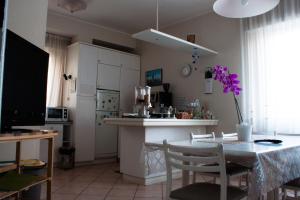 Kuchyň nebo kuchyňský kout v ubytování B&B Domus Benedicta