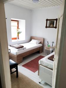 Postel nebo postele na pokoji v ubytování Kulla Dula Guesthouse