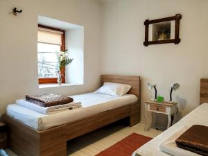 Postel nebo postele na pokoji v ubytování Kulla Dula Guesthouse