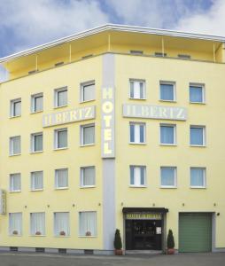 a yellow building with a sign that reads hotel leipzig at Hotel Ilbertz in Cologne