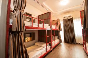 Postel nebo postele na pokoji v ubytování Hanoi Buffalo Hostel