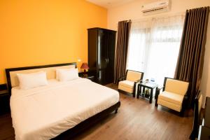 Letto o letti in una camera di Hanoi Buffalo Hostel