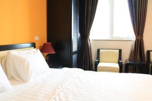 Letto o letti in una camera di Hanoi Buffalo Hostel