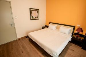 Letto o letti in una camera di Hanoi Buffalo Hostel