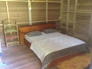 Säng eller sängar i ett rum på Orau Inn