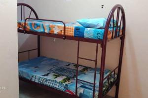 Krevet ili kreveti na kat u jedinici u objektu Didi Tanah Merah Homestay
