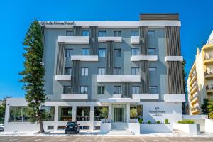 a rendering of the front of a building at Glyfada Riviera Hotel in Athens
