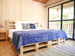 Letto o letti in una camera di Palm Forest Palolem