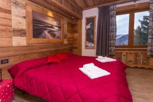 Ein Bett oder Betten in einem Zimmer der Unterkunft Hotel Sauze