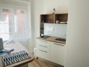 Kuchyň nebo kuchyňský kout v ubytování Apartmani SB 42