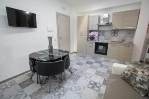 Kuchyňa alebo kuchynka v ubytovaní La Maison d'Irene