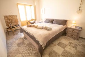 Posteľ alebo postele v izbe v ubytovaní La Maison d'Irene