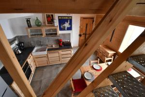 an overhead view of a kitchen in a cabin at chalet perché in LʼHuez