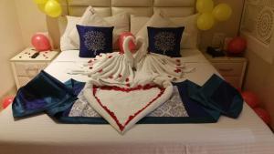 Cama o camas de una habitación en Nagpal Regency