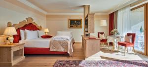Ένα ή περισσότερα κρεβάτια σε δωμάτιο στο Hotel Sassongher