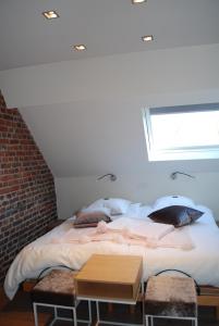 Een bed of bedden in een kamer bij In 't Groen
