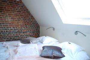 Een bed of bedden in een kamer bij In 't Groen
