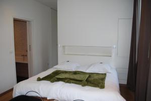 Een bed of bedden in een kamer bij In 't Groen