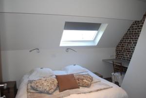 Een bed of bedden in een kamer bij In 't Groen