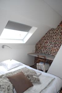 Een bed of bedden in een kamer bij In 't Groen