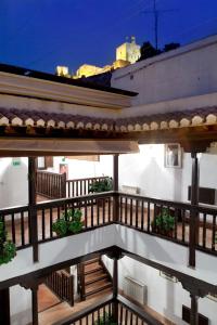 a view of the balcony of a building at Casa del Capitel Nazarí in Granada