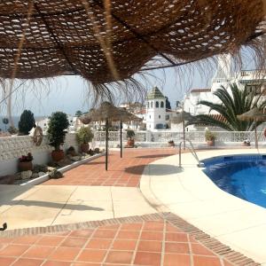 Basen w obiekcie Capistrano Playa 307 lub w pobliżu