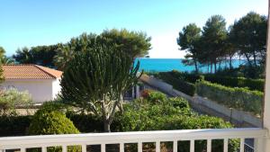 a view of the ocean from the balcony of a house at Villa Sara Timpi Russi in Sciacca