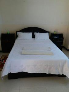 Postel nebo postele na pokoji v ubytování Hotel Delina Aksum
