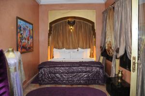 Ein Bett oder Betten in einem Zimmer der Unterkunft Riad Wow
