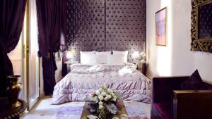 Ein Bett oder Betten in einem Zimmer der Unterkunft Riad Wow