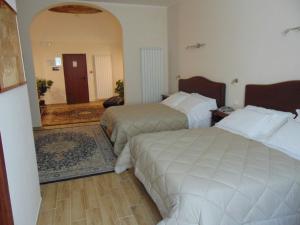 Cama o camas de una habitación en Hotel Europa