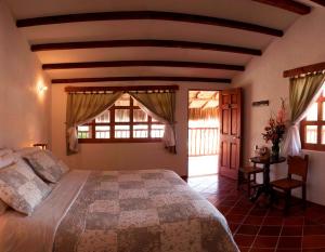 Postel nebo postele na pokoji v ubytování Posada Campestre La Casona