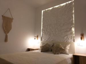 Кровать или кровати в номере Greek Blue Apartment