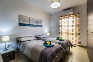 Letto o letti in una camera di Sunny Modern Apartments